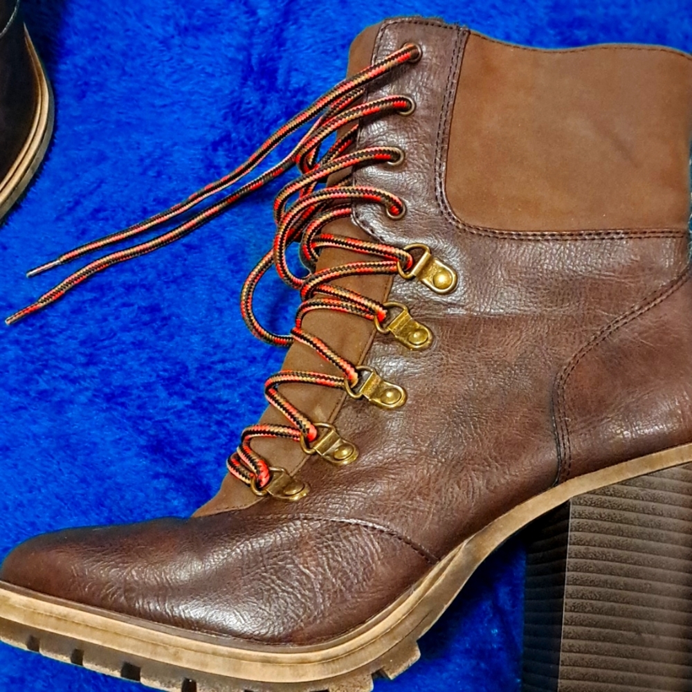 Union Bay combat boot..  Fleece lined. Size 8 medium. Brown in color.